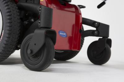 Silla de ruedas electrónica Invacare TDX SP2 NB Ultra Low Maxx compacta con tracción central y unidad de asiento modular. 